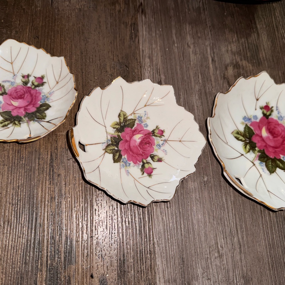 vintage porcelain leaf-shaped trinket dish with a pink rose and gold trim